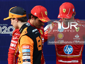 Oscar Piastri of McLaren, Carlos Sainz and Charles Leclerc of Ferrari after qualifying ahead of the Formula 1 Grand Prix of Azerbaijan at Ba...