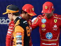 Oscar Piastri of McLaren, Carlos Sainz and Charles Leclerc of Ferrari after qualifying ahead of the Formula 1 Grand Prix of Azerbaijan at Ba...