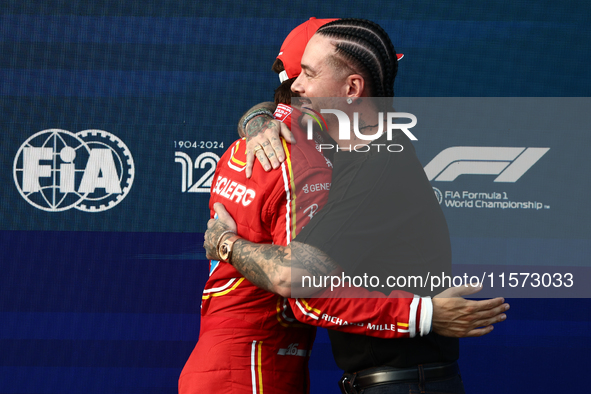 Charles Leclerc of Ferrari and J Balvin after qualifying ahead of the Formula 1 Grand Prix of Azerbaijan at Baku City Circuit in Baku, Azerb...