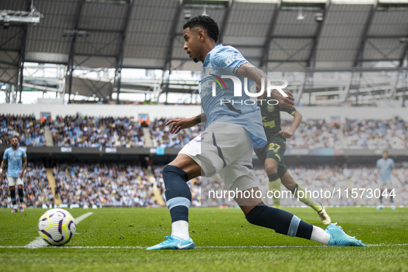 Savinho #26 of Manchester City F.C. is in action during the Premier League match between Manchester City and Brentford at the Etihad Stadium...