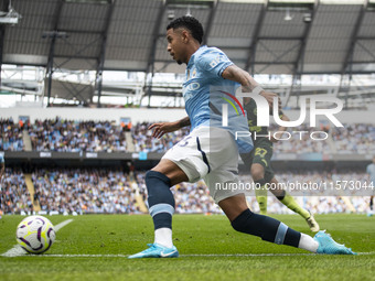 Savinho #26 of Manchester City F.C. is in action during the Premier League match between Manchester City and Brentford at the Etihad Stadium...