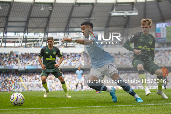 Savinho #26 of Manchester City F.C. is in action during the Premier League match between Manchester City and Brentford at the Etihad Stadium...