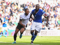 Ebou Adams of Derby County battles with Wilfried Kanga of Cardiff City during the Sky Bet Championship match between Derby County and Cardif...