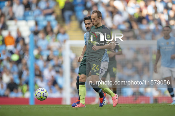 Mikkel Damsgaard #24 of Brentford F.C. during the Premier League match between Manchester City and Brentford at the Etihad Stadium in Manche...