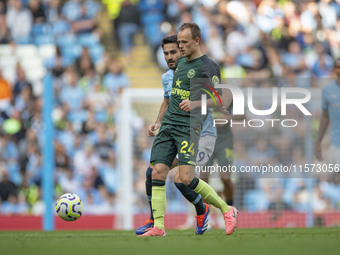 Mikkel Damsgaard #24 of Brentford F.C. during the Premier League match between Manchester City and Brentford at the Etihad Stadium in Manche...