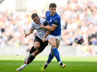 Jerry Yates of Derby County battles with William Fish of Cardiff City during the Sky Bet Championship match between Derby County and Cardiff...