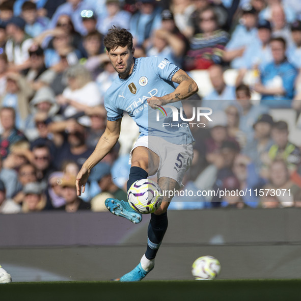 John Stones #5 of Manchester City F.C. during the Premier League match between Manchester City and Brentford at the Etihad Stadium in Manche...