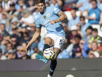 John Stones #5 of Manchester City F.C. during the Premier League match between Manchester City and Brentford at the Etihad Stadium in Manche...