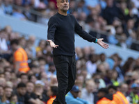 Manchester City F.C. manager Pep Guardiola gesticulates during the Premier League match between Manchester City and Brentford at the Etihad...