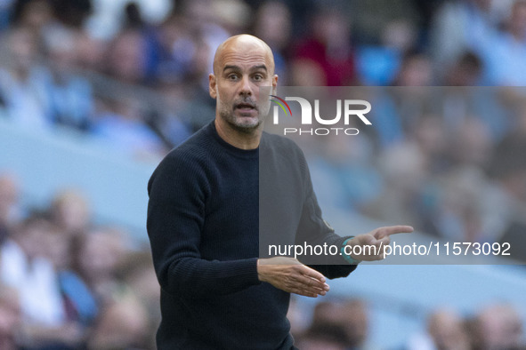 Manchester City F.C. manager Pep Guardiola gesticulates during the Premier League match between Manchester City and Brentford at the Etihad...