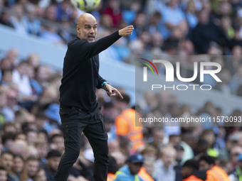 Manchester City F.C. manager Pep Guardiola gesticulates during the Premier League match between Manchester City and Brentford at the Etihad...