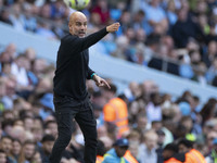 Manchester City F.C. manager Pep Guardiola gesticulates during the Premier League match between Manchester City and Brentford at the Etihad...