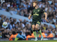 Kristoffer Ajer #20 of Brentford F.C. during the Premier League match between Manchester City and Brentford at the Etihad Stadium in Manches...