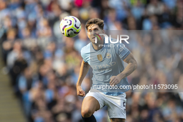 John Stones #5 of Manchester City F.C. during the Premier League match between Manchester City and Brentford at the Etihad Stadium in Manche...