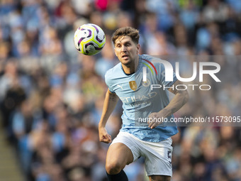 John Stones #5 of Manchester City F.C. during the Premier League match between Manchester City and Brentford at the Etihad Stadium in Manche...