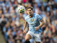 John Stones #5 of Manchester City F.C. during the Premier League match between Manchester City and Brentford at the Etihad Stadium in Manche...