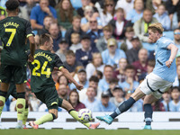 Kevin De Bruyne #17 of Manchester City F.C. takes a shot at goal during the Premier League match between Manchester City and Brentford at th...