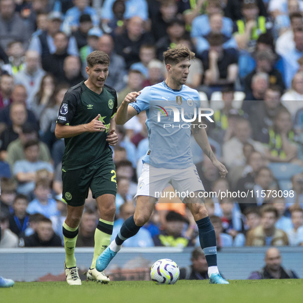 John Stones #5 of Manchester City F.C. during the Premier League match between Manchester City and Brentford at the Etihad Stadium in Manche...