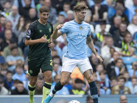 John Stones #5 of Manchester City F.C. during the Premier League match between Manchester City and Brentford at the Etihad Stadium in Manche...