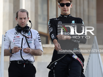 Marcus Dudley and George Russell of Mercedes before qualifying ahead of the Formula 1 Grand Prix of Azerbaijan at Baku City Circuit in Baku,...