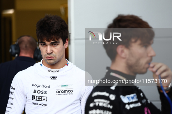 Lance Stroll of Aston Martin Aramco and Pierre Gasly of Alpine during qualifying ahead of the Formula 1 Grand Prix of Azerbaijan at Baku Cit...