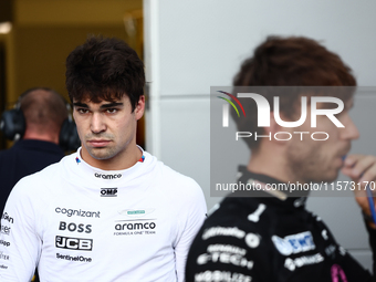 Lance Stroll of Aston Martin Aramco and Pierre Gasly of Alpine during qualifying ahead of the Formula 1 Grand Prix of Azerbaijan at Baku Cit...