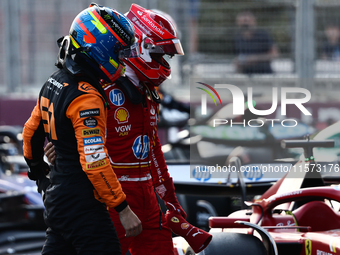 Oscar Piastri of McLaren and Charles Leclerc of Ferrari after qualifying ahead of the Formula 1 Grand Prix of Azerbaijan at Baku City Circui...