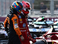 Oscar Piastri of McLaren and Charles Leclerc of Ferrari after qualifying ahead of the Formula 1 Grand Prix of Azerbaijan at Baku City Circui...