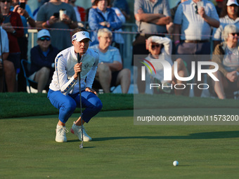 GAINESVILLE, VIRGINIA - SEPTEMBER 14: Esther Henseleit of Team Europe lines up her putt on the third green during Foursome Matches on Day Tw...