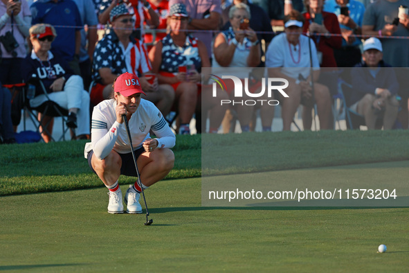 GAINESVILLE, VIRGINIA - SEPTEMBER 14: Ally Ewing of the United States lines up her putt on the third green during Foursome Matches on Day Tw...