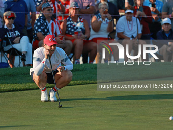 GAINESVILLE, VIRGINIA - SEPTEMBER 14: Ally Ewing of the United States lines up her putt on the third green during Foursome Matches on Day Tw...