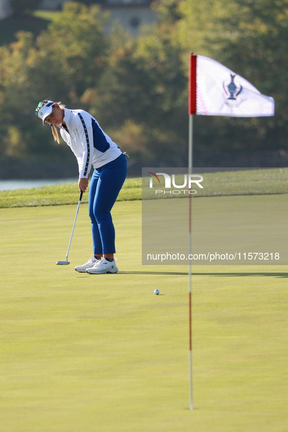 GAINESVILLE, VIRGINIA - SEPTEMBER 14: Emily Kristine Pedersen of Team Europe follows her putt on the 9th green during Foursomes Matches on D...