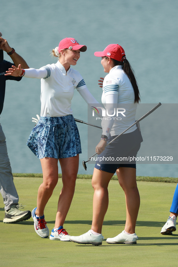 GAINESVILLE, VIRGINIA - SEPTEMBER 14: Nelly Korda of the United States celebrates with teammate Allisen Corpuz on the 18th green during Four...