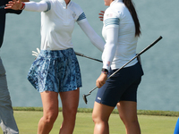 GAINESVILLE, VIRGINIA - SEPTEMBER 14: Nelly Korda of the United States celebrates with teammate Allisen Corpuz on the 18th green during Four...