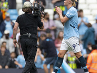 Erling Haaland #9 of Manchester City F.C. applauds at full time during the Premier League match between Manchester City and Brentford at the...