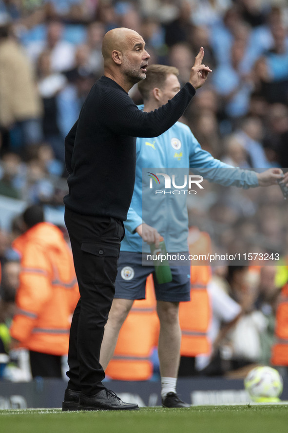 Manchester City F.C. manager Pep Guardiola during the Premier League match between Manchester City and Brentford at the Etihad Stadium in Ma...