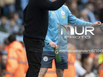 Manchester City F.C. manager Pep Guardiola during the Premier League match between Manchester City and Brentford at the Etihad Stadium in Ma...