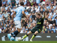 Nathan Collins #22 of Brentford F.C. crosses the ball during the Premier League match between Manchester City and Brentford at the Etihad St...