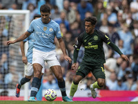 Rodri #16 of Manchester City F.C. is in possession of the ball during the Premier League match between Manchester City and Brentford at the...