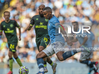 Manuel Akanji #25 of Manchester City F.C. is in action during the Premier League match between Manchester City and Brentford at the Etihad S...