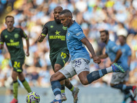 Manuel Akanji #25 of Manchester City F.C. is in action during the Premier League match between Manchester City and Brentford at the Etihad S...