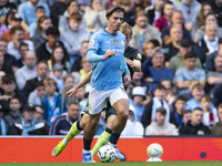 Jack Grealish #10 of Manchester City F.C. is in action during the Premier League match between Manchester City and Brentford at the Etihad S...