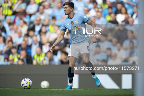 John Stones #5 of Manchester City F.C. during the Premier League match between Manchester City and Brentford at the Etihad Stadium in Manche...