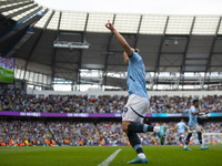 Erling Haaland #9 of Manchester City F.C. celebrates his goal during the Premier League match between Manchester City and Brentford at the E...