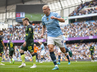 Erling Haaland #9 of Manchester City F.C. celebrates his goal during the Premier League match between Manchester City and Brentford at the E...