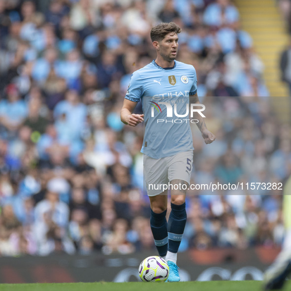 John Stones #5 of Manchester City F.C. during the Premier League match between Manchester City and Brentford at the Etihad Stadium in Manche...