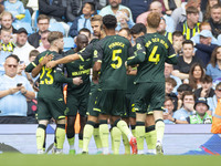 Brentford F.C. celebrate the goal during the Premier League match between Manchester City and Brentford at the Etihad Stadium in Manchester,...