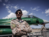 A Royal Saudi Air Force pilot poses in front of an aircraft during the Athens Flying Show in Tanagra, Greece, on September 14, 2024. (