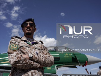 A Royal Saudi Air Force pilot poses in front of an aircraft during the Athens Flying Show in Tanagra, Greece, on September 14, 2024. (