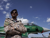 A Royal Saudi Air Force pilot poses in front of an aircraft during the Athens Flying Show in Tanagra, Greece, on September 14, 2024. (